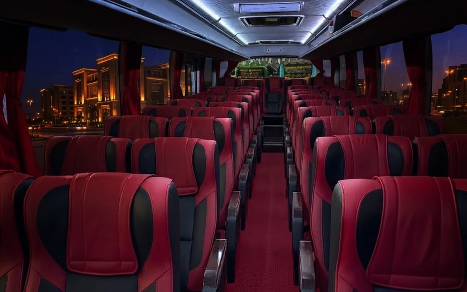 Mini Bus cabin: the same red and black two-by-two seating as Executive